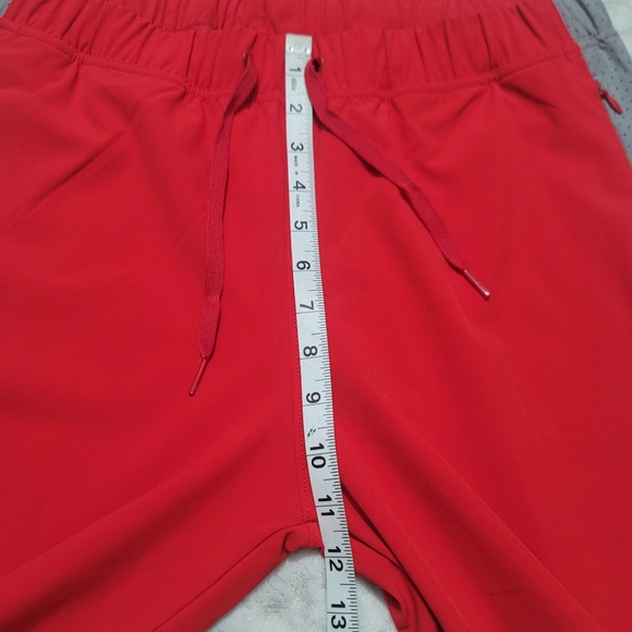 Under Armour Women's Woven Warm Up Pants Size  M‎ Red/gray NWT - Picture 12 of 16